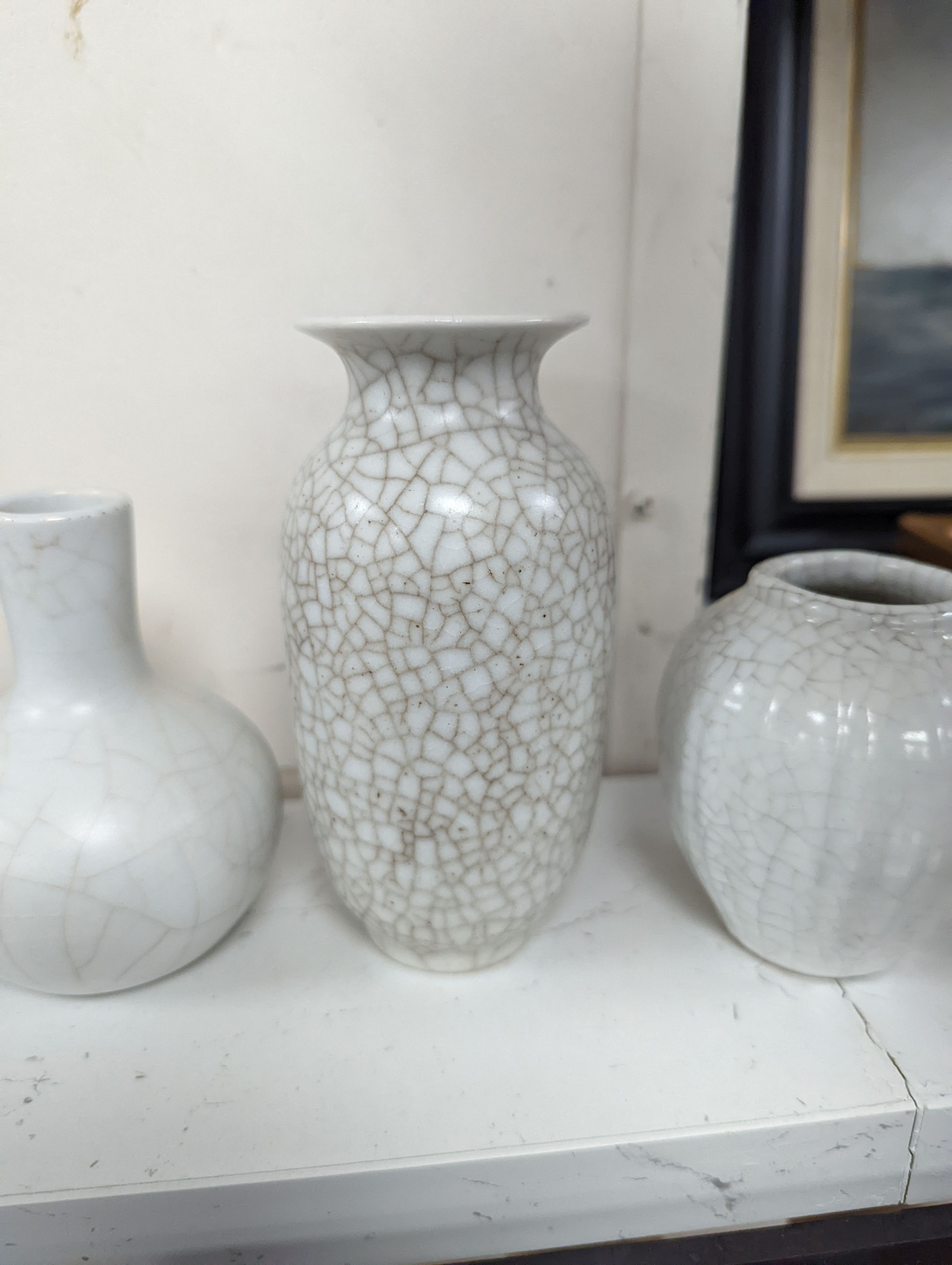 Four Chinese crackle glaze vases, tallest 16 cms high.